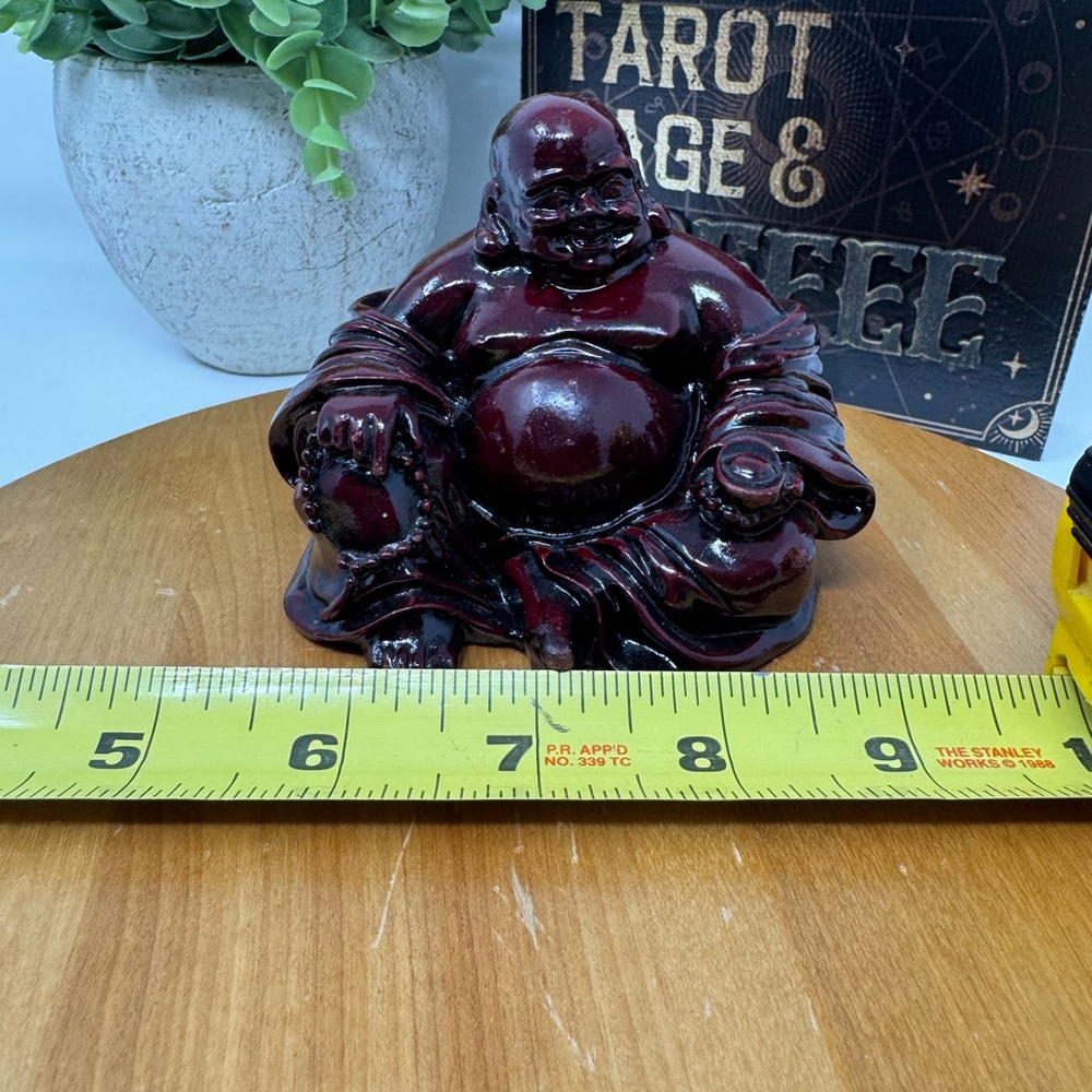Burgundy Buddha Figurine made of wood and red resin coating